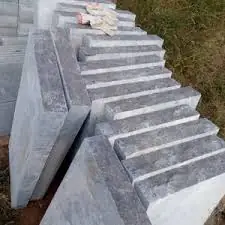 Limestone wall caps stacked on a pallet