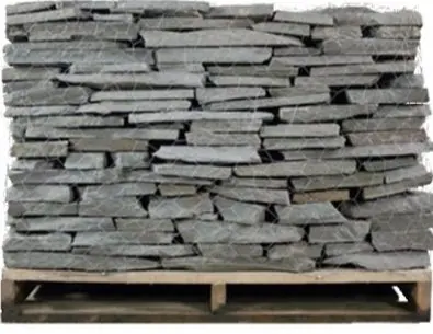 Thin grey slate stacked on a pallet